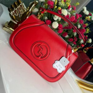 The Idumota "Iconic Curve" Satchel: Sculptural Form, Bold Command