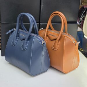 The Idumota "Urban Antigona" Satchel: Sculptural Symmetry & Modern Command