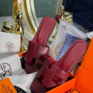 Hermès Oran Sandals – Iconic Leather H-Cut Slides in Gold, Black, White, Red, Navy & Forest Green