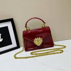 The Idumota "Sacred Heart" Patent Satchel: A Masterpiece of Baroque Glamour