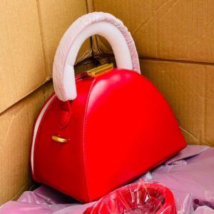 The Idumota Sculptural Half-Moon Satchel: Architectural Elegance for the Urban Muse