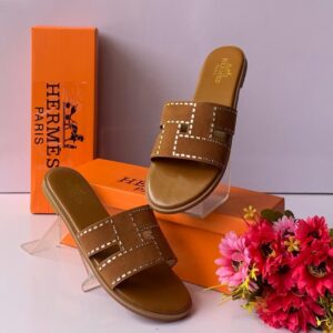 Hermès Paris Women’s Oran-Style Embroidered Slides – Luxury Suede Cut-Out Flat Sandals in Noir & Cognac