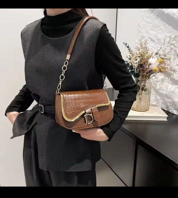 Saddle Silhouette" Croc-Embossed Shoulder Bag Collection,