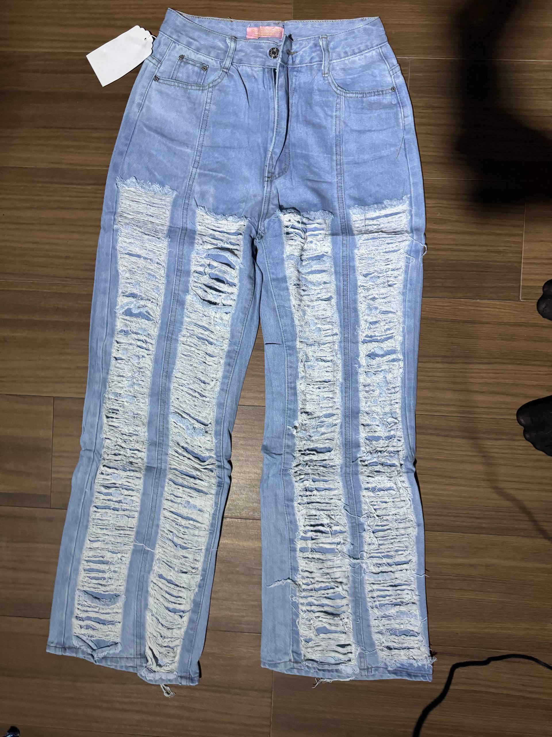 Multi-Panel Heavily Distressed Ripped Denim