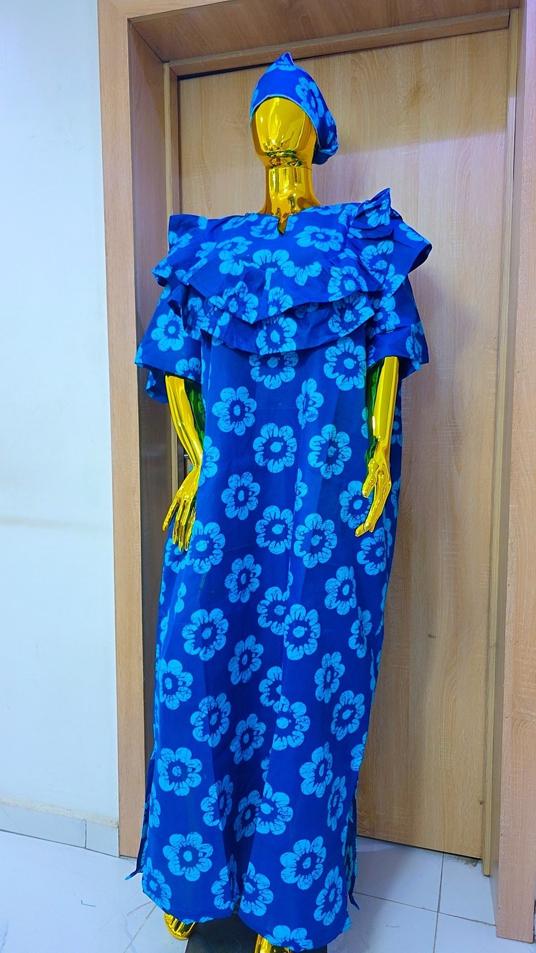 Bold Leaf-Print Gown with Ruffled Neckline Detail