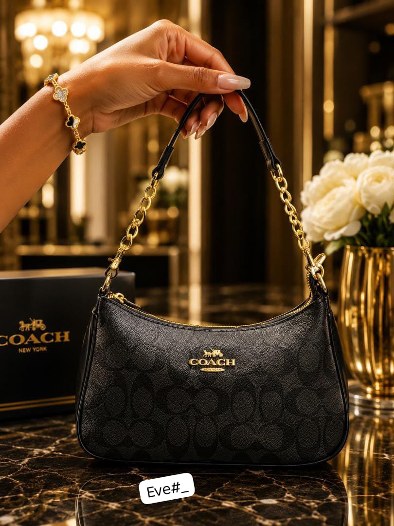 Luxury Curved Underarm Shoulder Bag with Gold-Tone Chain Accent & Leather Hangtag