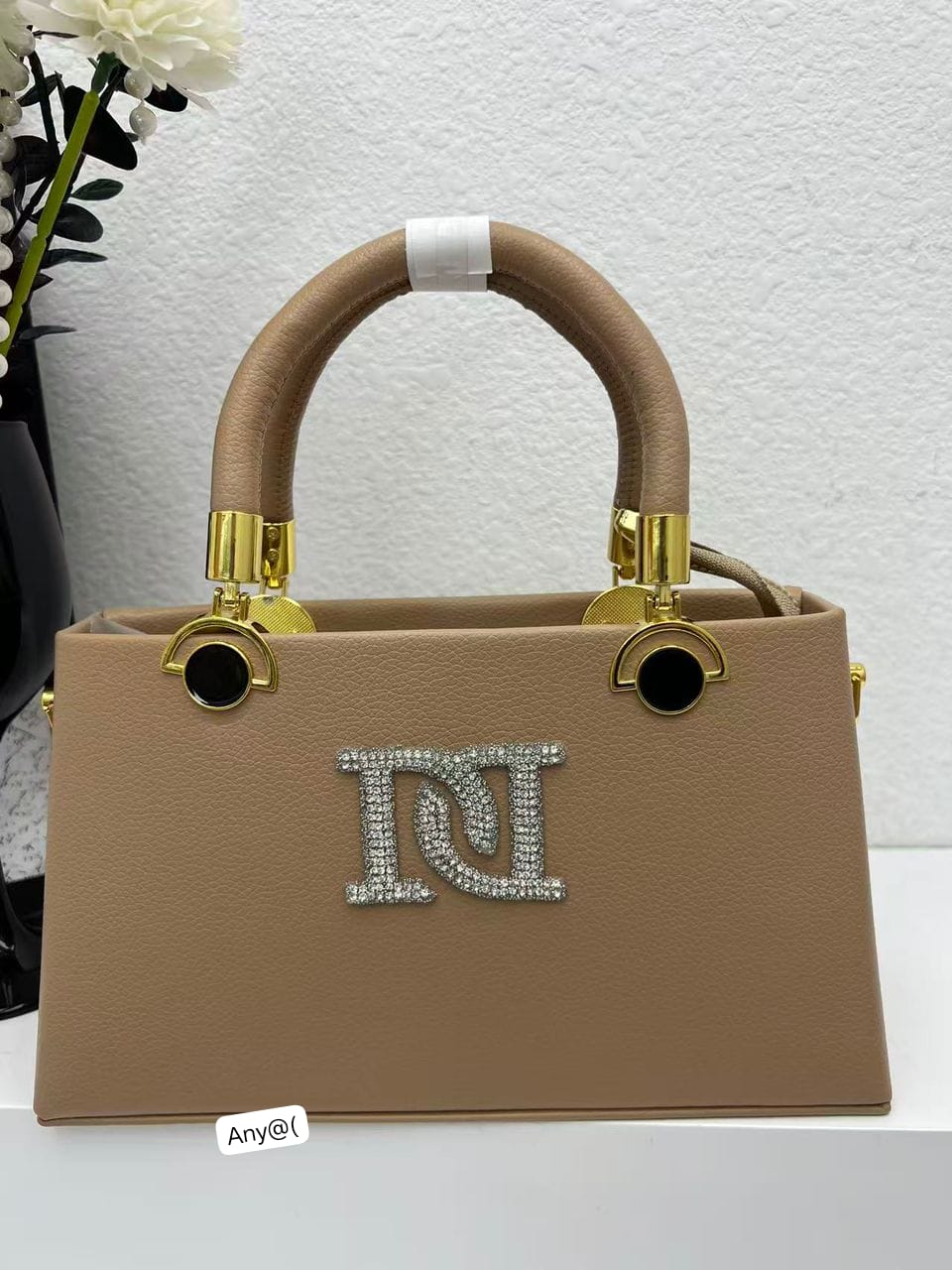 Elegant Textured Trapeze Tote with Architectural Padded Handle