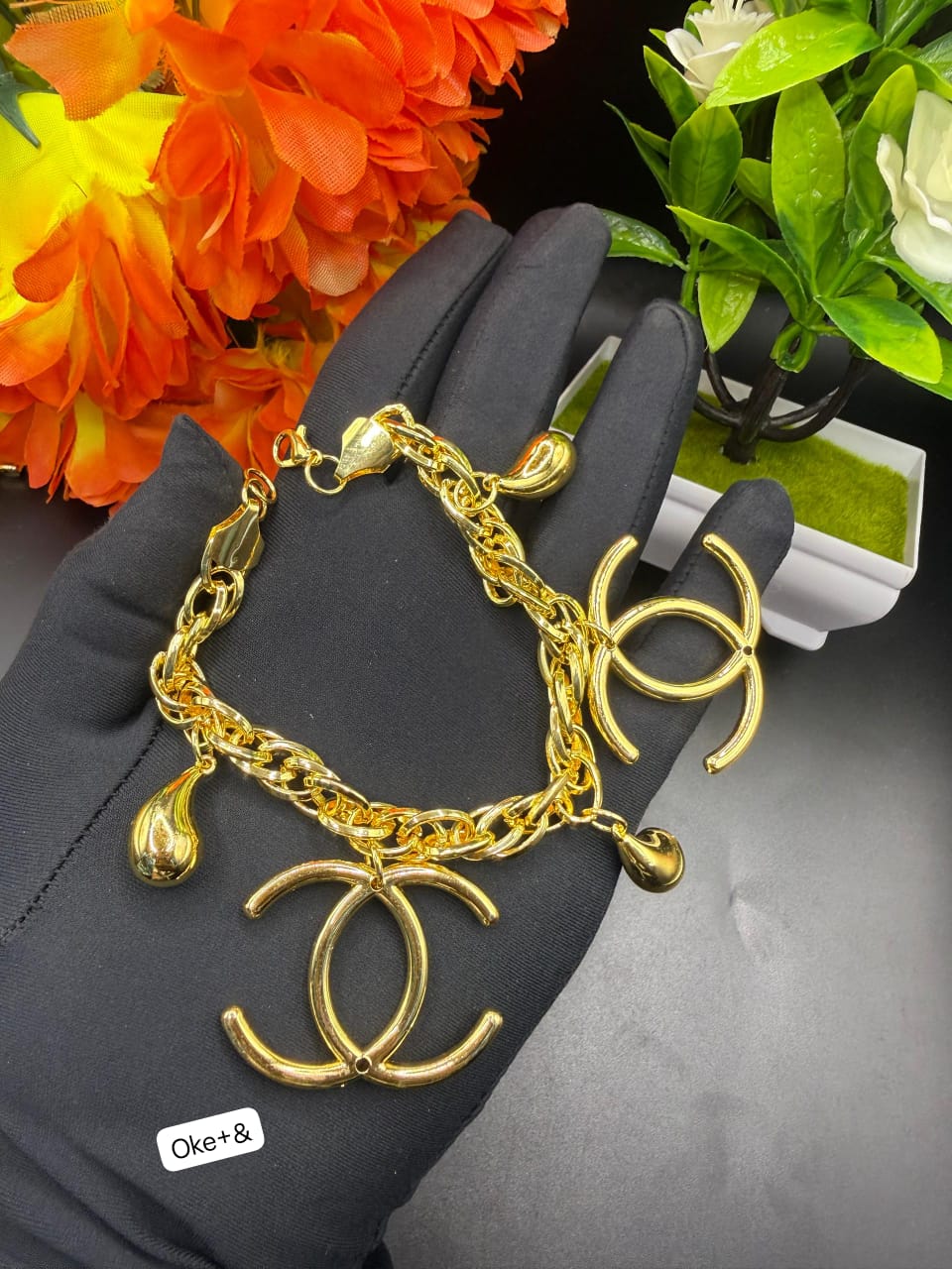 Gold-Plated Chunky Charm Bracelet with Oversized Designer Monogram