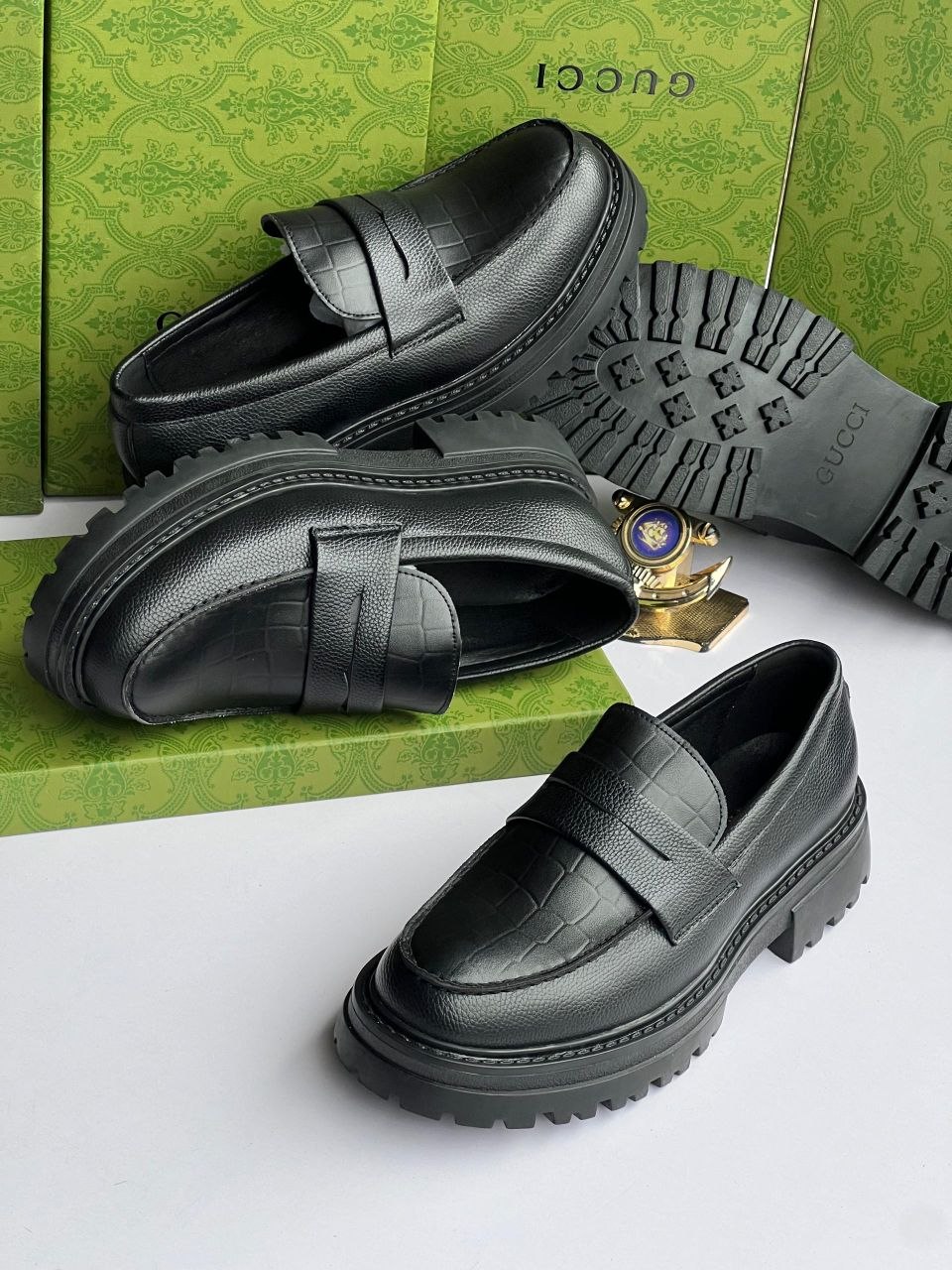 Gucci Pebbled Penny Loafers