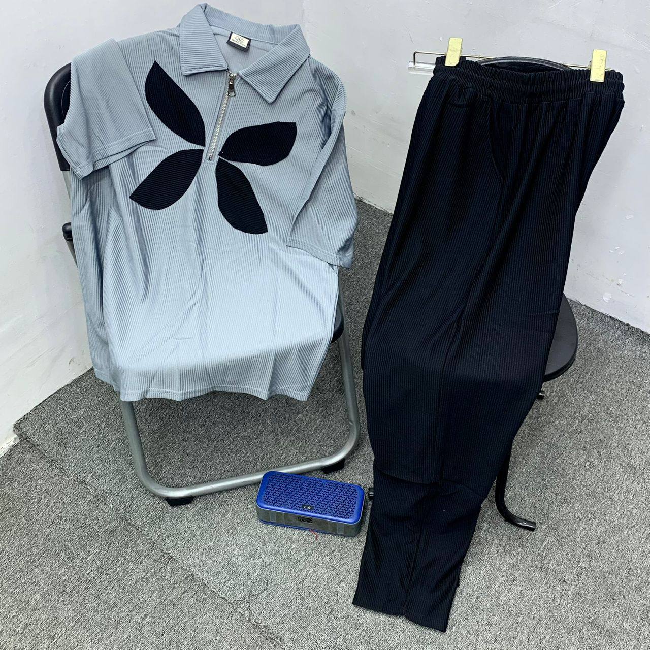 Men's Plissé Pleated Quarter-Zip Polo and Trousers Set - Abstract Center Graphic- Ice Blue Base (with Black Graphic / Black Pants)
