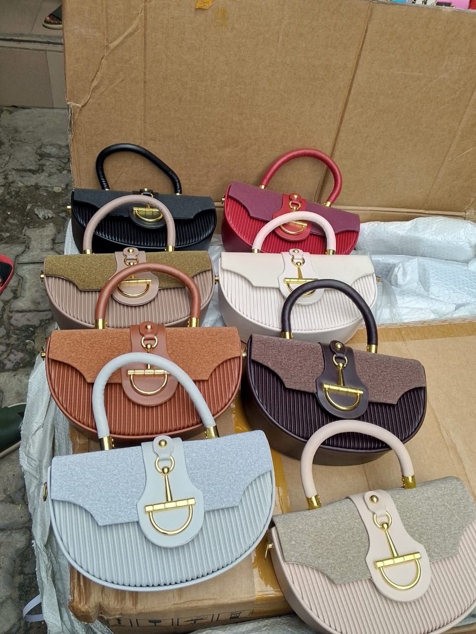 Dior Saddle-inspired pleated half-moon handbag