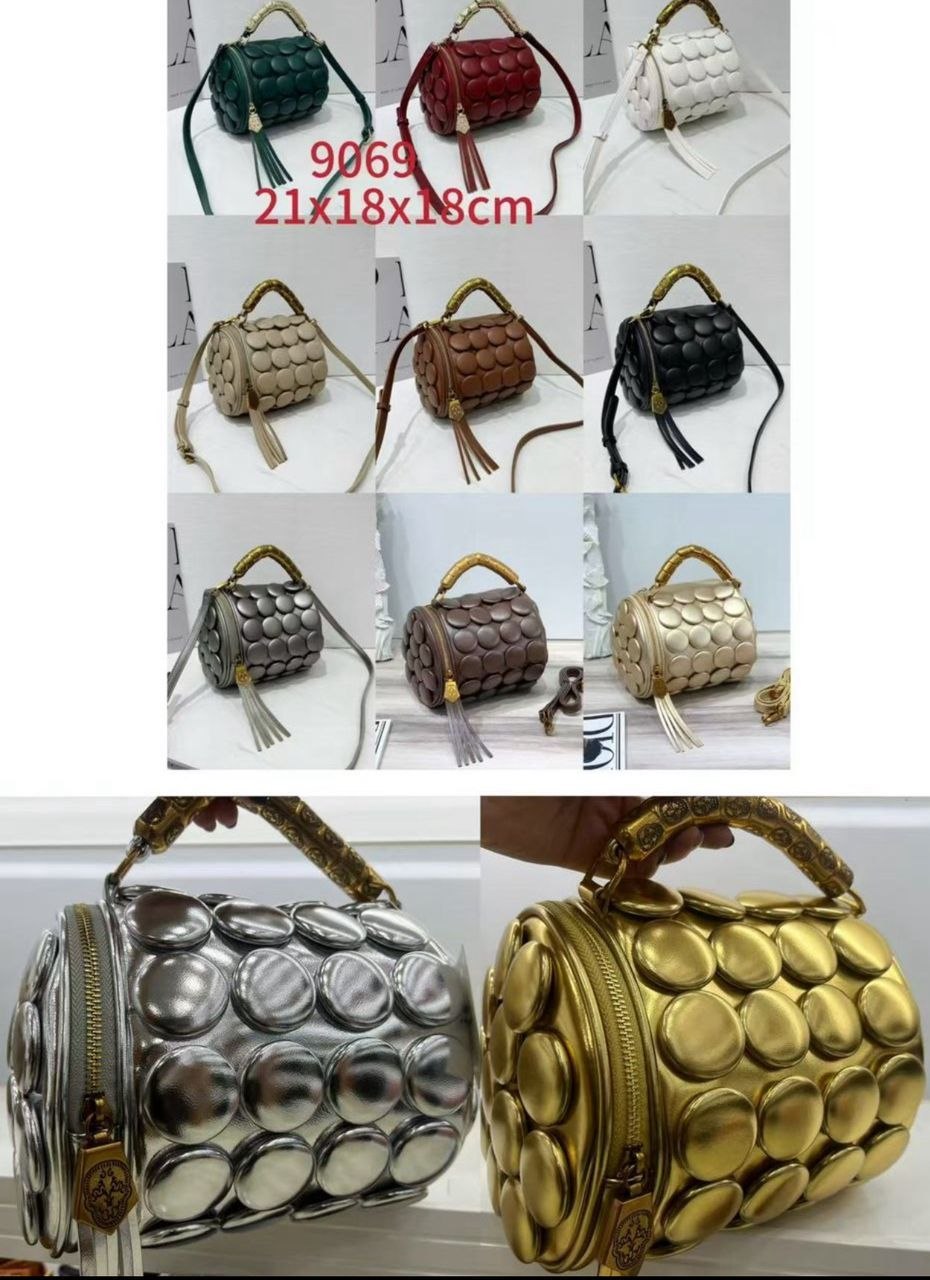 distinctive button-appliqué cylindrical barrel bag