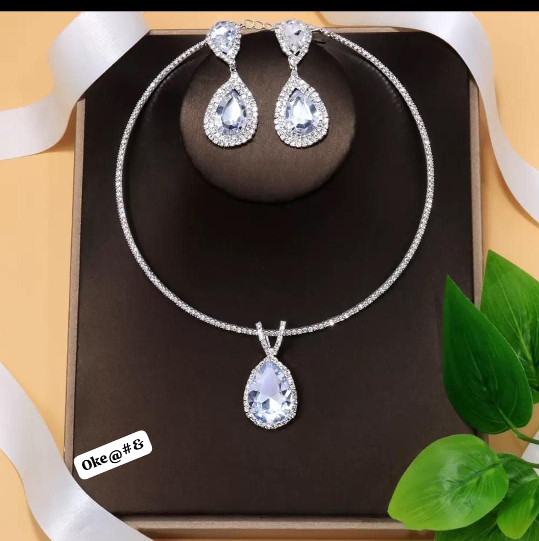 Premium Silver-Plated Tear-Drop Crystal Torque Necklace & Drop Earrings Set