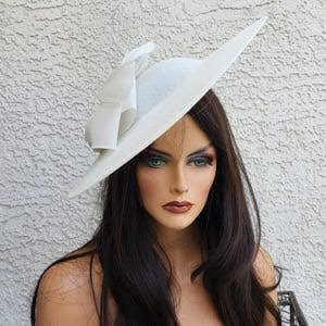 White Slanted Disk with Statement Bow
