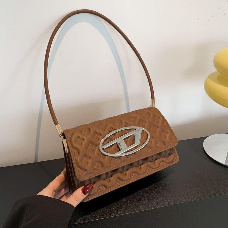 Cyber-Monogram" Embossed Saddle Baguette Collection