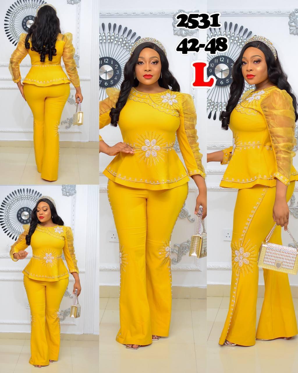 Luxury Two-Piece Peplum Top and Trouser Set - Image 4